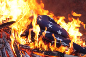 US Flag burning on a Pyre